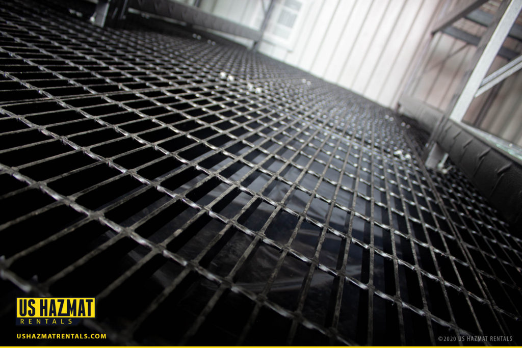 Secondary spill containment sump with 1" grated steel flooring for complete EPA compliance.